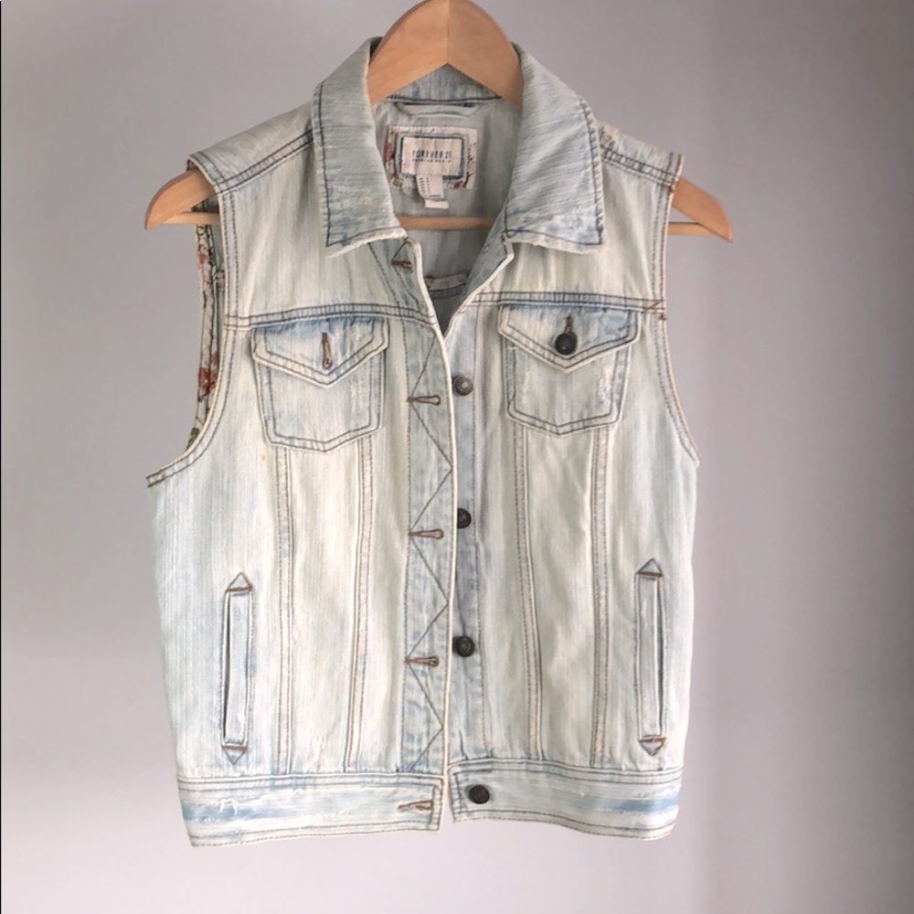 Distressed light denim vest